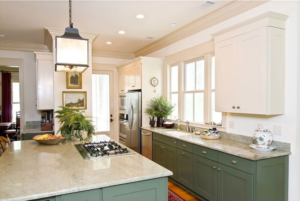 Kitchen with crown moulding around ceiling