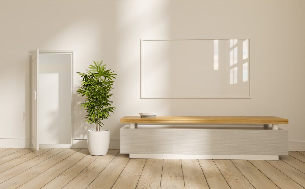 Modern living room with white baseboard moulding and hardwood floors