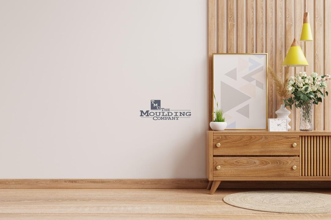 Wood floor with baseboards, shoe moulding, and transition trim showing different types of floor moulding