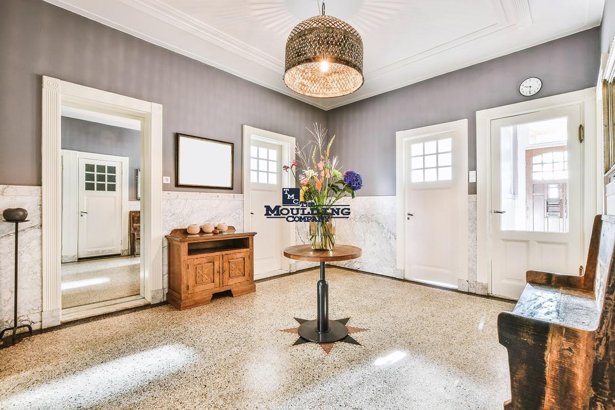 Interior room showing new trim matched to old trim with similar proportions and style