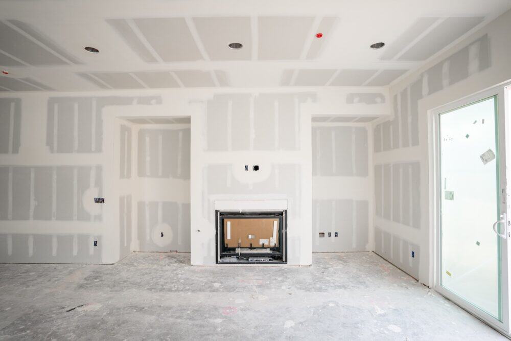 Interior wall with drywall and molding in progress at The Moulding Company.