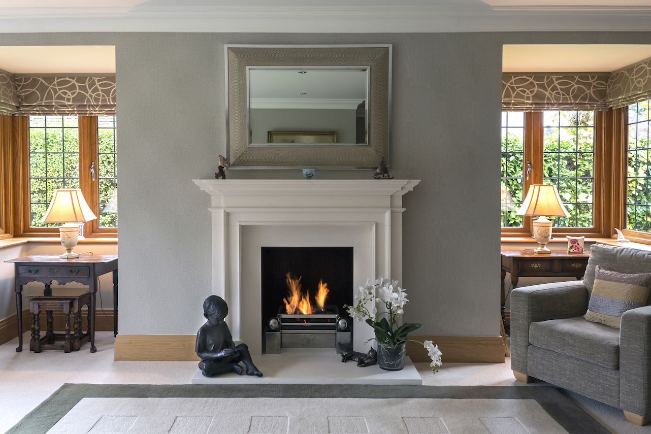 Interior trim creating seamless transitions between connected living spaces with matching baseboards, door casings, and crown moulding